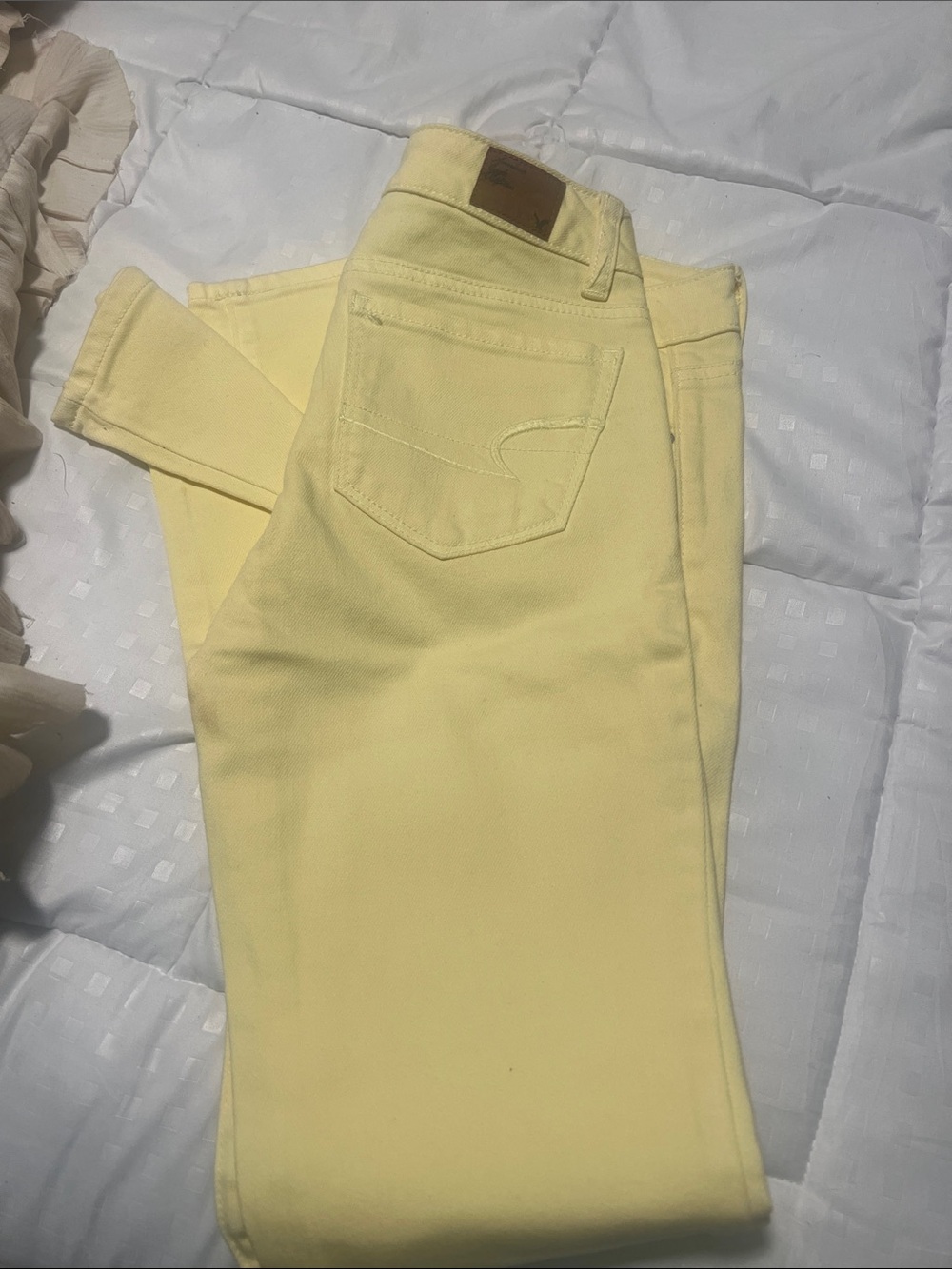 American Eagle Outfitters Pastel Yellow Skinny Jeans